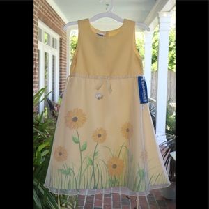 DRESS BY THOMAS IS A SUNFLOWER SENSATION AND IS NWT. PERFECT SUMMER DRESS!